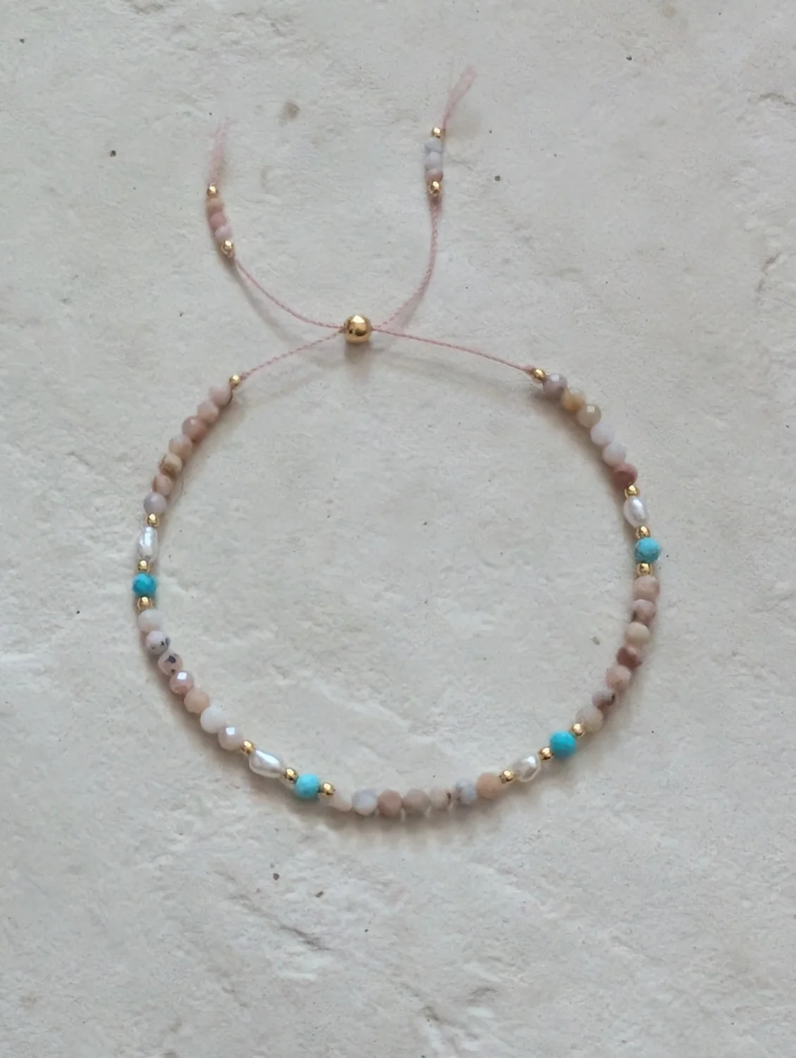 Bransoletka z opalem, perłą i magnezytem